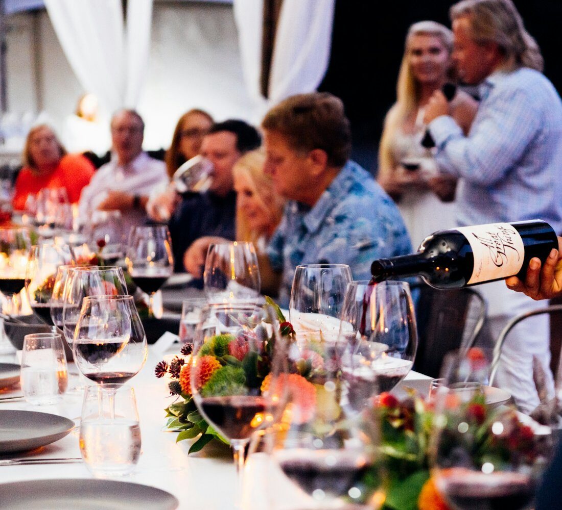 A group of people at an outdoor dinner