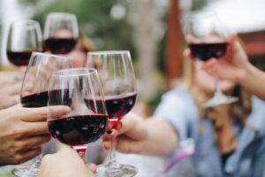Small group clinking glasses