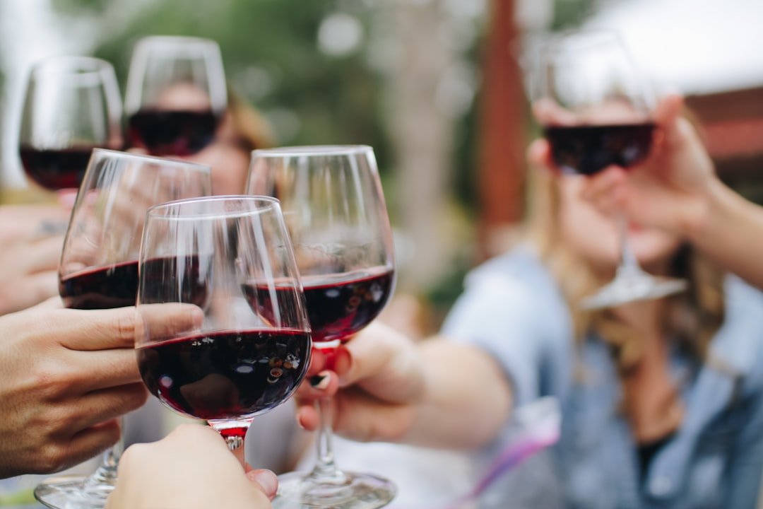 Small Group Dining Small group clinking glasses